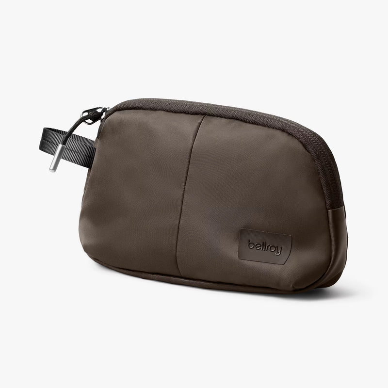 Bellroy Laneway Daily Pouch in compact textured fabric with a zip closure and adjustable strap