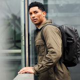 Bellroy Transit Workpack 20L backpack with multiple compartments, padded shoulder straps, and sleek black design for commuting.