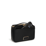 Tumi Voyageur leather Myla crossbody bag with adjustable strap and front zip pocket, stylish and compact for everyday use.