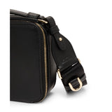 Tumi Voyageur leather Myla crossbody bag with adjustable strap and sleek design, perfect for everyday use.