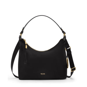 Tumi Voyageur Asbury shoulder bag with adjustable crossbody strap, featuring sleek design and multiple compartments for everyday use.
