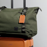 Bellroy luggage tag in a minimalist leather design with a secure strap and address window