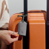 Bellroy luggage tag in a sleek, durable design for easy travel identification