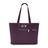 Briggs & Riley Baseline Traveler Tote bag with sturdy handles, spacious interior, and sleek design for travel and everyday use.