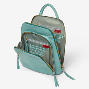 Teal Osgoode Marley Belle Backpack shown from the side, featuring a spacious design, adjustable straps, and stylish detailing.