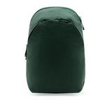 Peak Design City Backpack 15L in Cypress color, showing its sleek exterior with zippered compartments and comfortable shoulder straps.