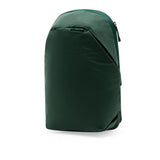 Peak Design City Backpack 15L in Cypress, showing the sleek nylon exterior with adjustable shoulder straps and front pocket.