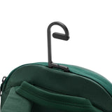 Peak Design City Backpack 15L in Cypress color, showing the sleek exterior with adjustable straps and front zip pocket.