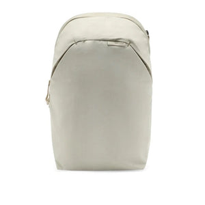 Peak Design City Backpack 15L in Moon color, featuring a sleek design, top handle, and adjustable straps for everyday use.