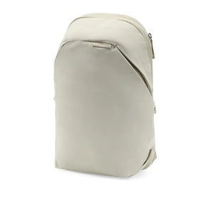 Peak Design City Backpack 15L in Moon color, showing the sleek exterior with padded shoulder straps and main zipper compartment.