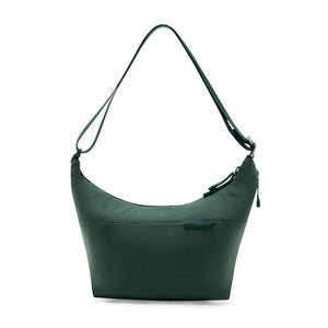 Peak Design City Crescent 6L in Cypress, showcasing compact urban backpack with sleek design and durable materials.
