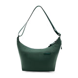 Peak Design City Crescent 6L in Cypress, showcasing compact urban backpack with sleek design and durable materials.