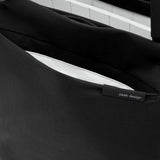 Black Peak Design City Tote bag with spacious interior and durable fabric, ideal for daily use and urban commuting.