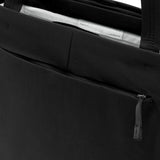 Black Peak Design City Tote with 15L capacity, featuring multiple compartments and durable fabric for everyday carry.
