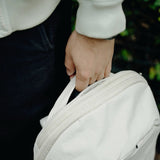 Peak Design City Backpack 15L in urban lifestyle setting, showcasing the stylish, functional design and spacious interior.