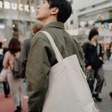 Peak Design City Tote in black, showcasing its stylish exterior, spacious interior, and durable fabric for everyday use.