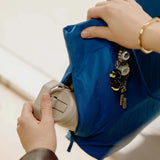 Peak Design City Tote in black, showcasing its spacious interior and sleek urban-style design for versatile daily use.