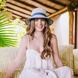 Wallaroo Hat Company Darby UPF 50+ packable sun hat with wide brim and neutral fabric, designed for outdoor sun protection.