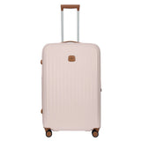 Bric's Taormina 30-inch expandable large spinner suitcase with hard shell, silver color, and four spinner wheels.