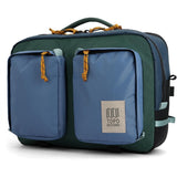 Topo Designs Global Briefcase showing durable canvas material, leather accents, top handle, and multiple compartments.