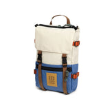 Topo Designs Rover Pack Mini backpack in black with adjustable shoulder straps and front zip pocket, suitable for everyday use.