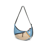 Topo Designs Moonlight crossbody bag in dark fabric with adjustable strap, front pocket, and minimalist design.
