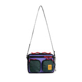 Topo Designs Block Bag crossbody bag in durable fabric with adjustable strap and front pocket, styled for everyday use.