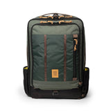 Topo Designs Global Travel Bag 30L backpack with adjustable straps, front zipper pocket, and durable navy fabric.