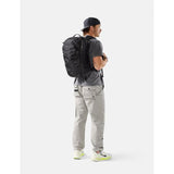 Black Matador 30L Carry On Travel Pack with compact design, durable material, and adjustable straps for easy travel.
