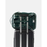 Matador 30L Carry On Travel Pack in juniper green, showing compact design with multiple compartments and durable fabric.