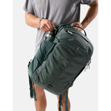 Matador 30L Carry On Travel Pack in juniper green, featuring compact design with multiple compartments and durable material.