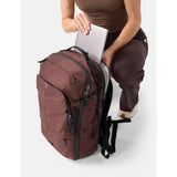 Matador 30L Carry On Travel Pack in garnet red, compact and durable with multiple compartments for travel organization.