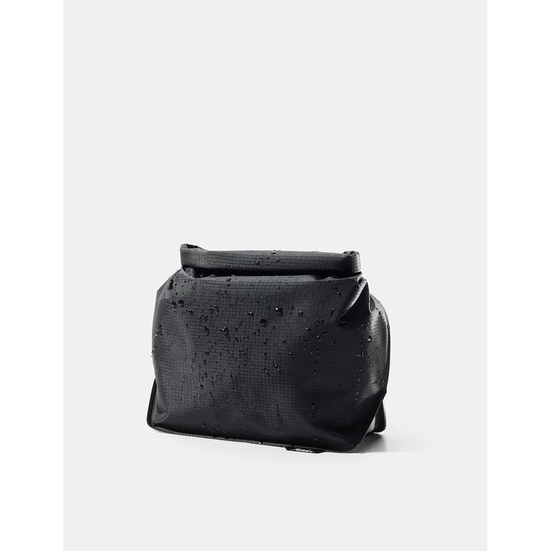 Matador FlatPak™ Toiletry Case V2 waterproof accessory in black, compact design with zipper closure and durable material.