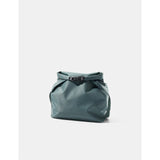 Matador FlatPak™ Toiletry Case V2 waterproof accessory with green fabric and compact design for travel toiletries.