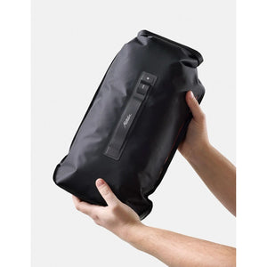 Matador Flatpak 8L dry bag in black, waterproof and lightweight, designed for outdoor gear protection and storage.