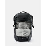 Matador 24L Adventure Pack in black with multiple compartments and durable fabric, designed for outdoor and travel use.
