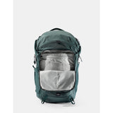Matador 24L Adventure Pack in juniper green with multiple compartments and adjustable straps, designed for outdoor travel and hiking.