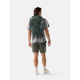 Matador 24L Adventure Pack in juniper green with multiple compartments and adjustable straps, designed for outdoor travel.