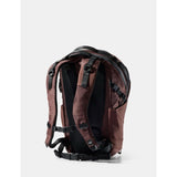 Matador 24L Adventure Pack in garnet color featuring durable nylon material and multiple compartments for outdoor gear storage.