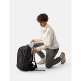 Black Matador 35L Global Travel Pack with multiple compartments and padded straps, designed for versatile travel and outdoor use.