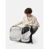 Black Matador 35L Global Travel Pack with multiple compartments and padded straps for comfortable travel and versatile storage.