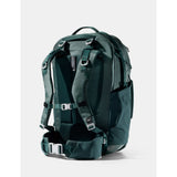 Matador 45L Global Travel Pack in juniper green, showing the compact, durable backpack with multiple compartments for travel gear.
