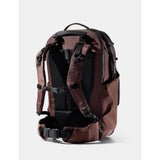 Matador 45L Global Travel Pack in garnet color, showing the compact backpack with adjustable straps and durable fabric.