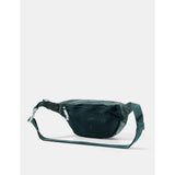 Matador 2L Lite Sling in juniper green, compact outdoor hydration pack showing adjustable straps and lightweight design.