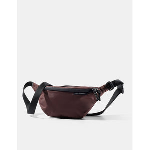 Matador 2L Lite Sling in garnet color, lightweight compact nylon bag with adjustable strap and front pocket for essentials