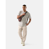 Matador 2L Lite Sling in garnet color, lightweight and compact nylon pouch with adjustable strap and zipper closure.