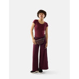 Matador 2L Lite Sling in garnet color, compact lightweight water bottle carrier with adjustable strap and clip.