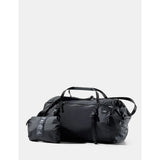 Black Matador 30L packable duffel bag laid flat, showing its compact, lightweight design and durable material.