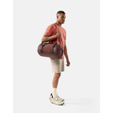 Matador 30L packable duffel bag in garnet color, lightweight and foldable for travel and storage.