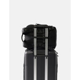 Matador 18L personal item travel pack in black with compact design and multiple compartments for easy organization.
